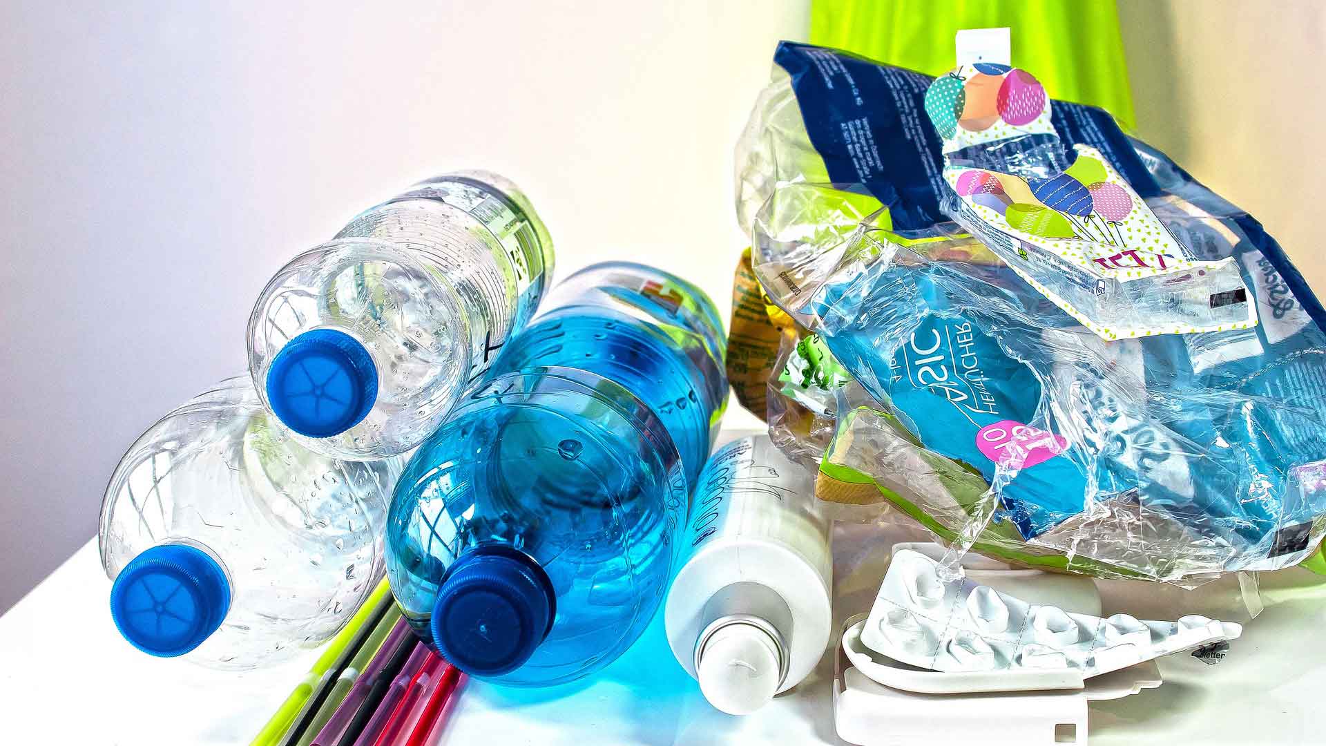 A bunch of plastic waste, primarily water bottles
