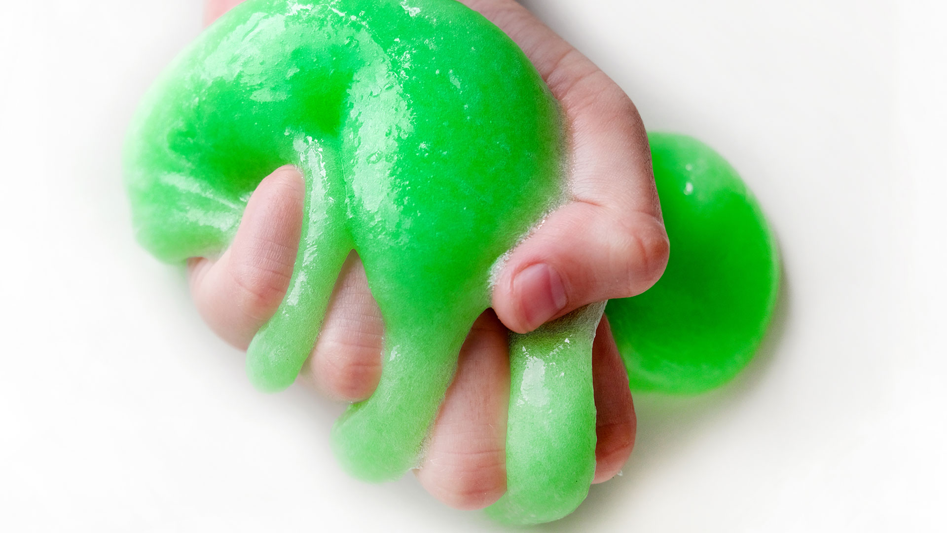 Green slime in a hand