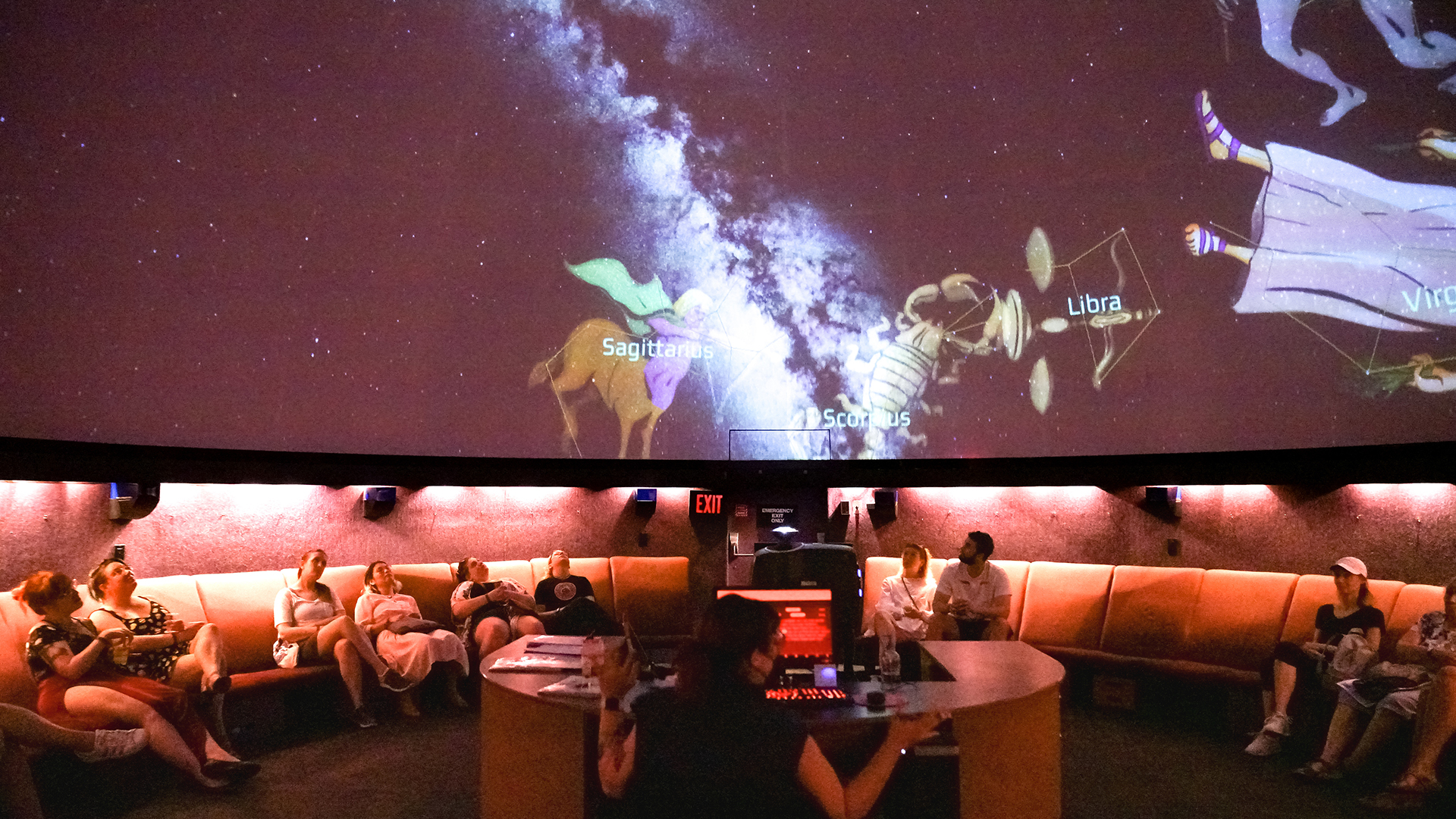 Guests attend a planetarium show