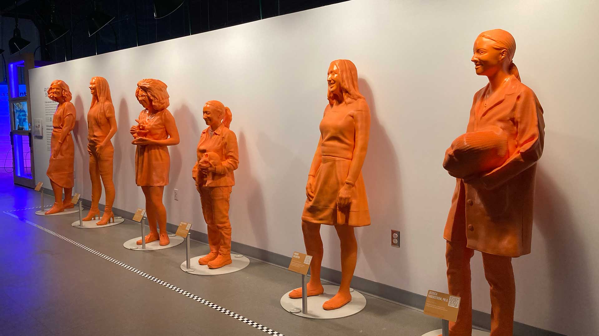 Orange statues in a row