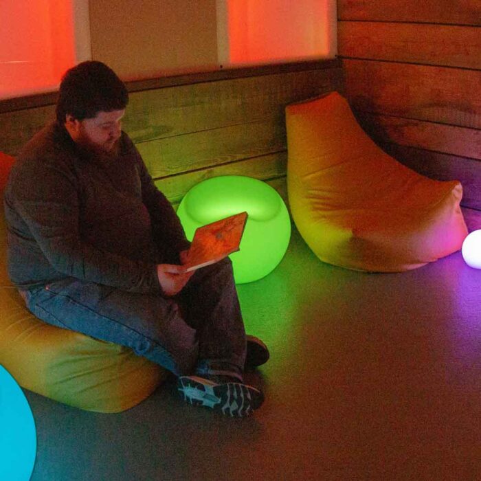 Man sitting in the Sensory Lounge