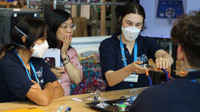 Three teens working in Tinker Tank