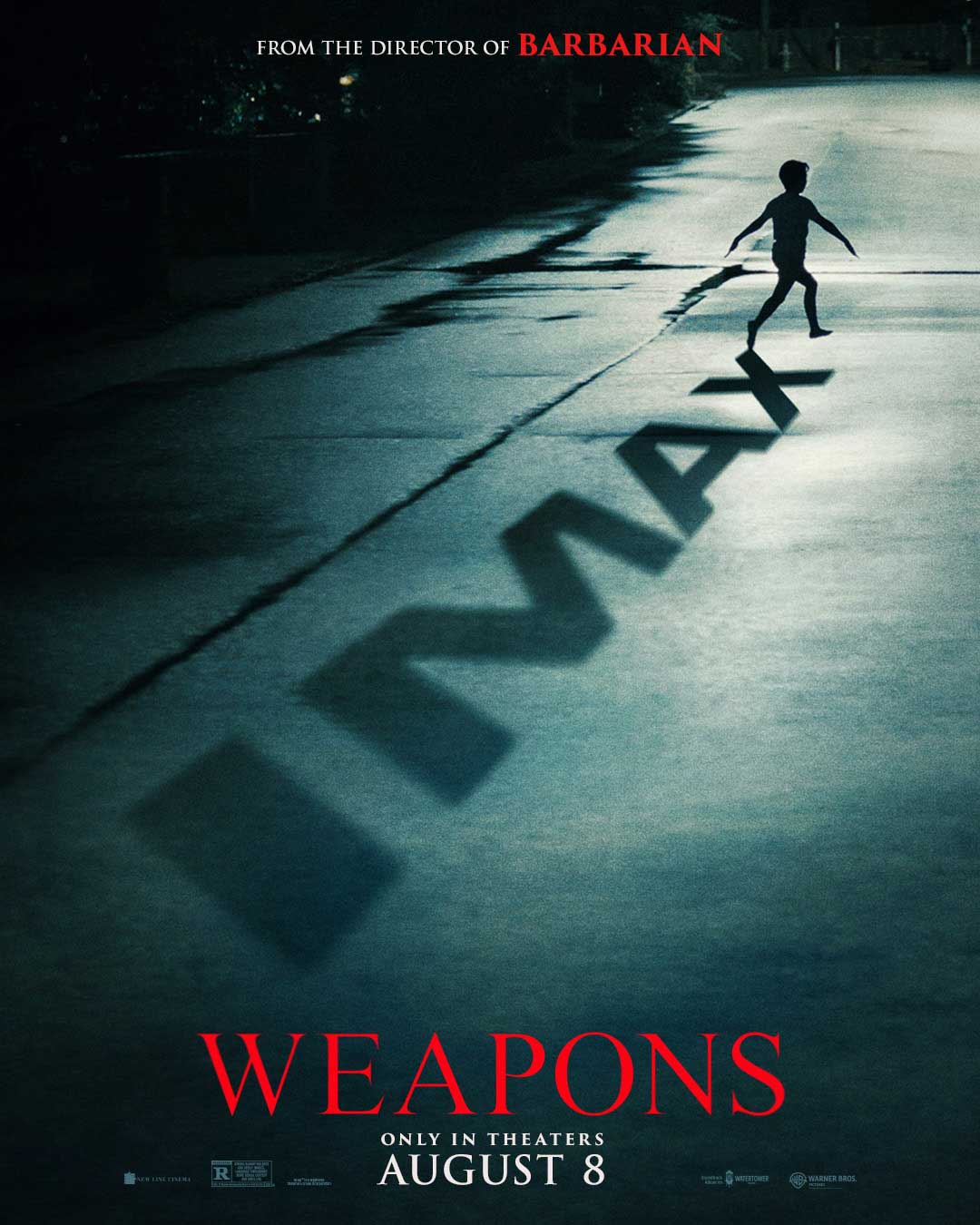 Child running down the street with IMAX written in shadows