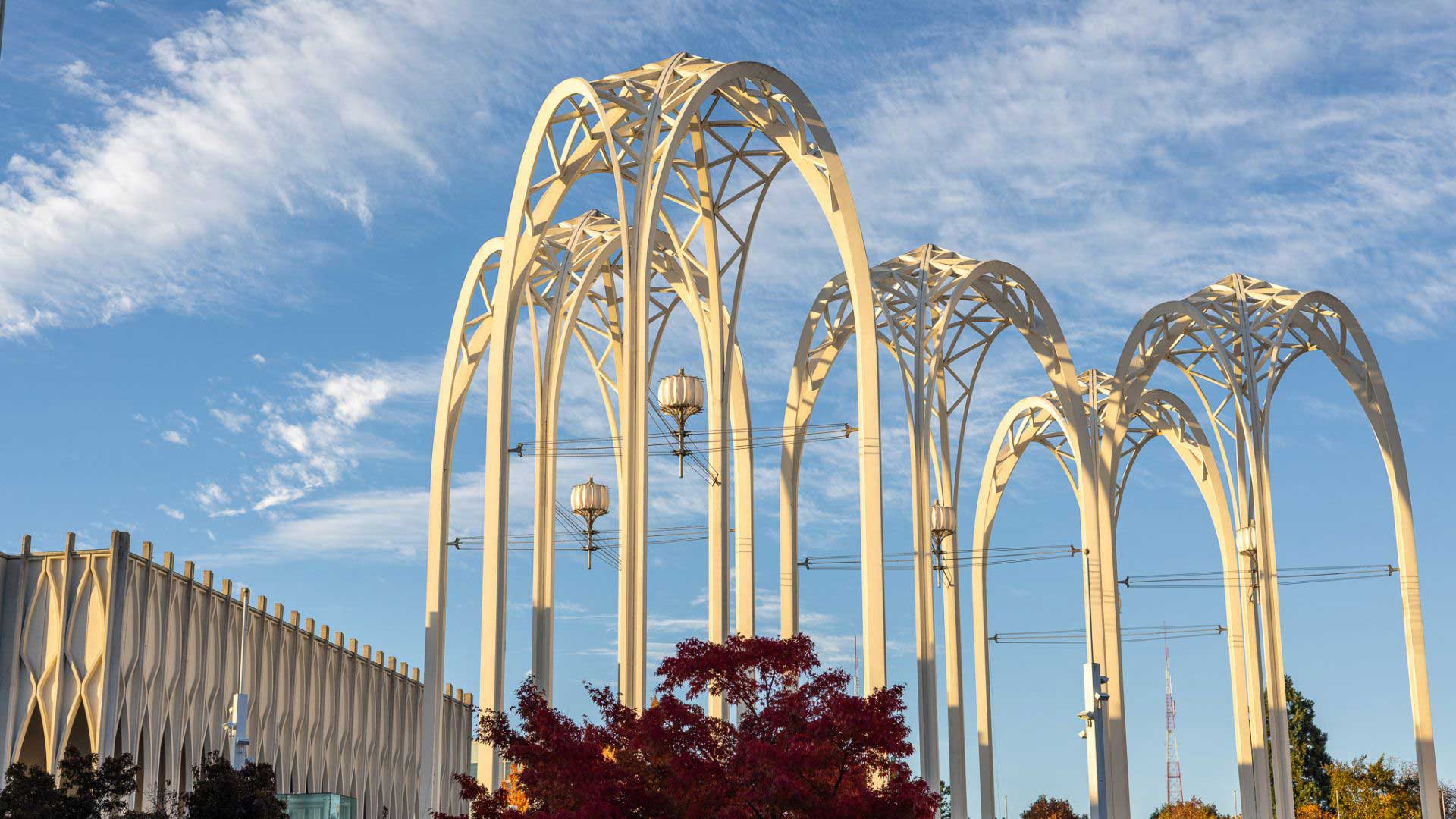 Pacific Science Center arches with red leaves