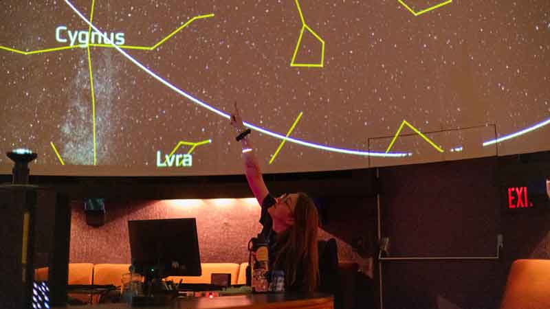 An instructor in the Willard Smith Planetarium